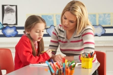Teacher Guiding Pupil to Answer Questions